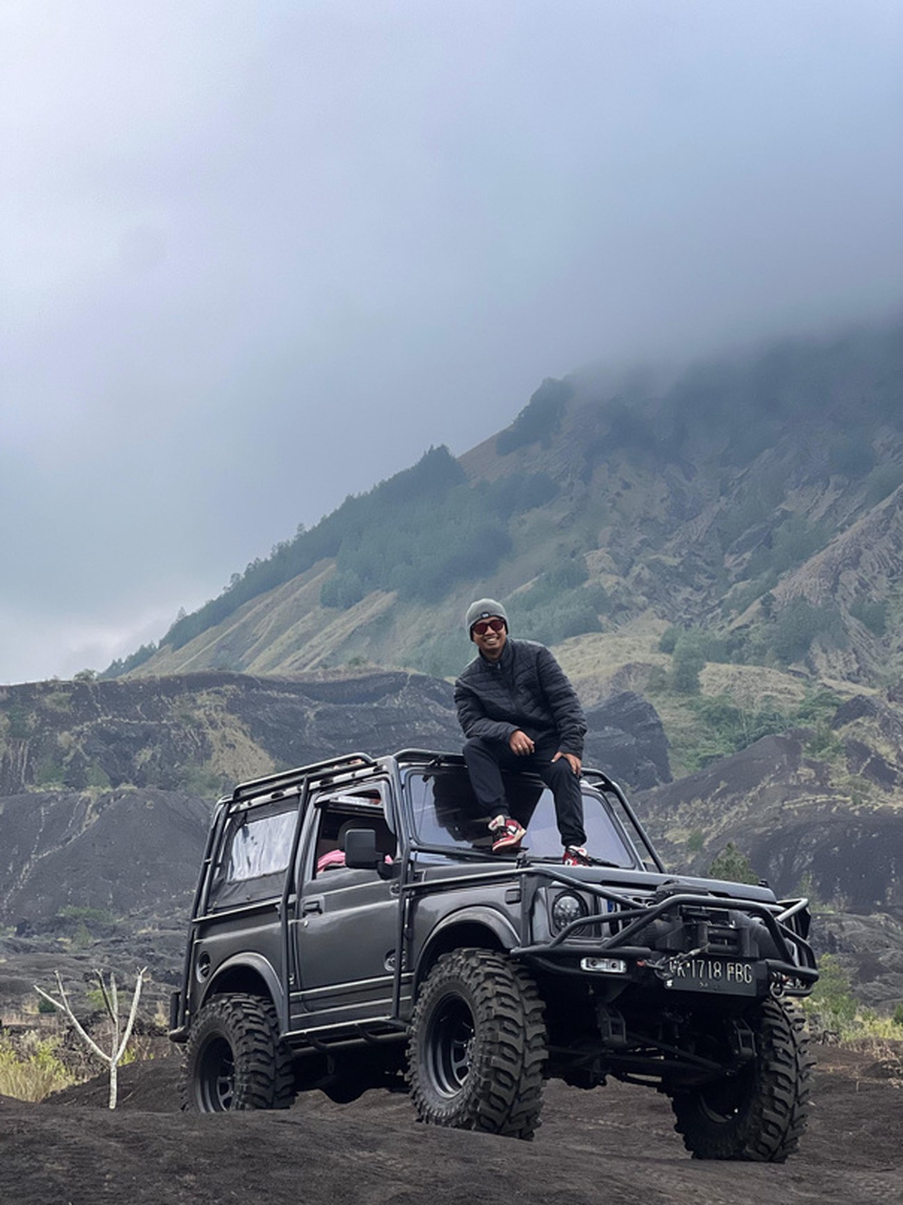 4x4 jeep on the black lava field of Mount Batur