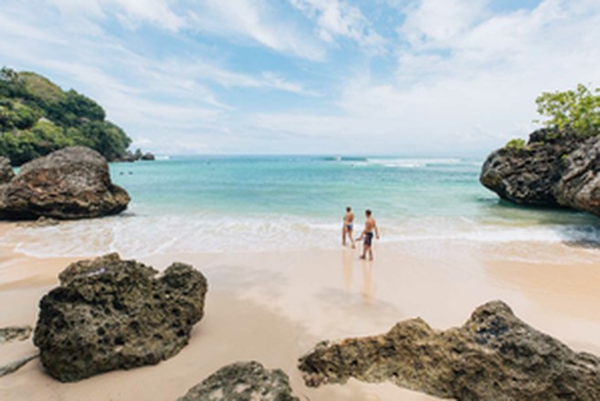 Padang Padang beach with white sand and rocks