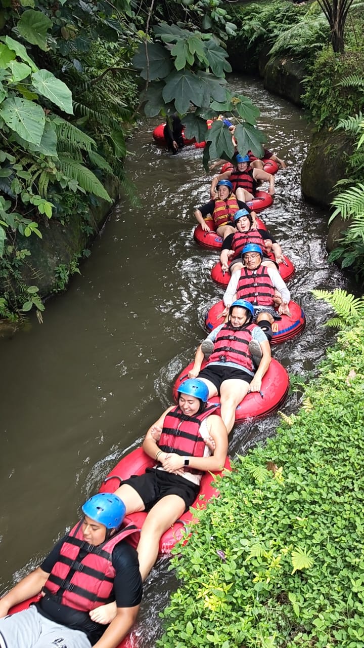 River tubing down a jungle river in Ubud
